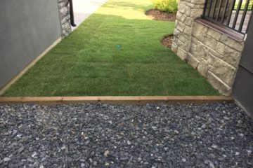 Treated wood 4 X 4 edging separating sod and 20mm rundle